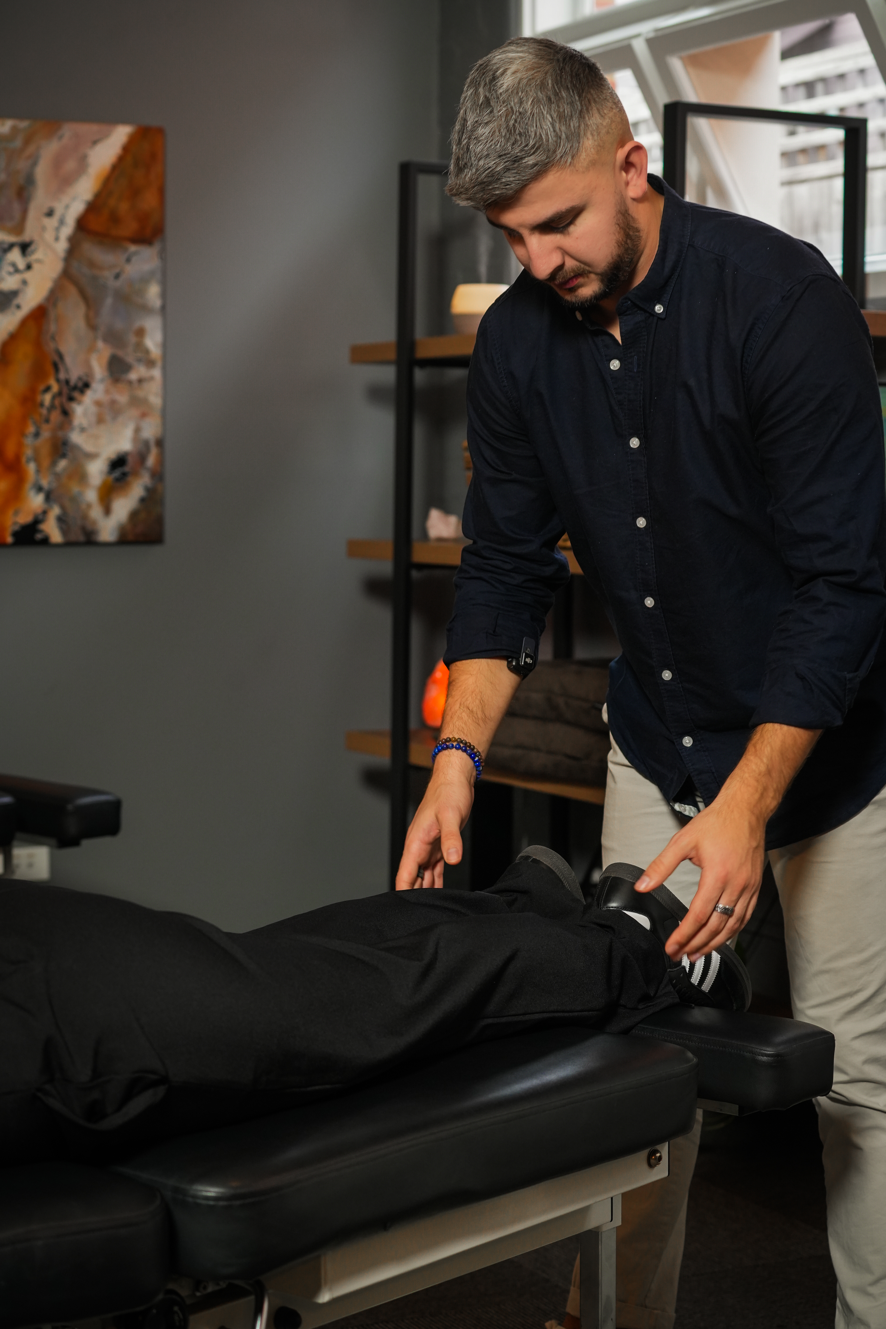 Dr Nick Harvey adjusting